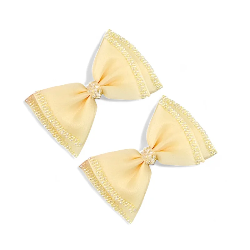 bohemian hairbands for relaxed vibes -The Freesia Girls Bow Clip Set